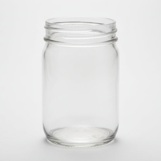 Clear glass jar on a white background
