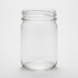Clear glass jar on a white background