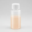 Small bottle with a white cap on a white background