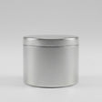 Candle tin on grey background