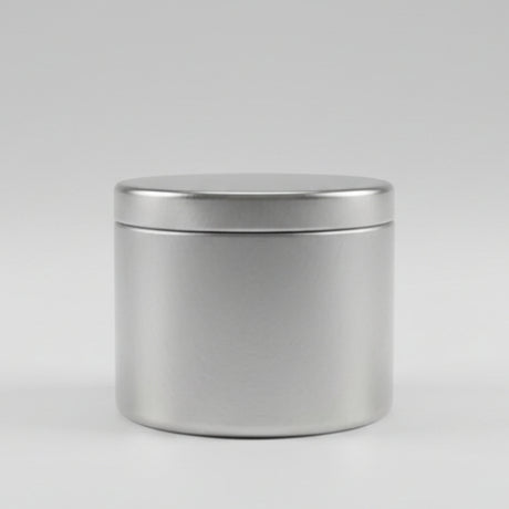 Candle tin on grey background