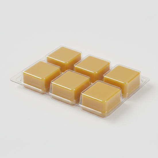 Six square yellow wax melts in a clear plastic packaging on a white background