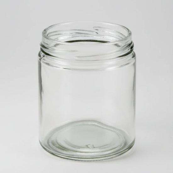 Clear glass jar on a white background