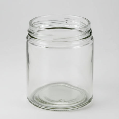 Clear glass jar on a white background