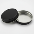 black metal lids on a white background
