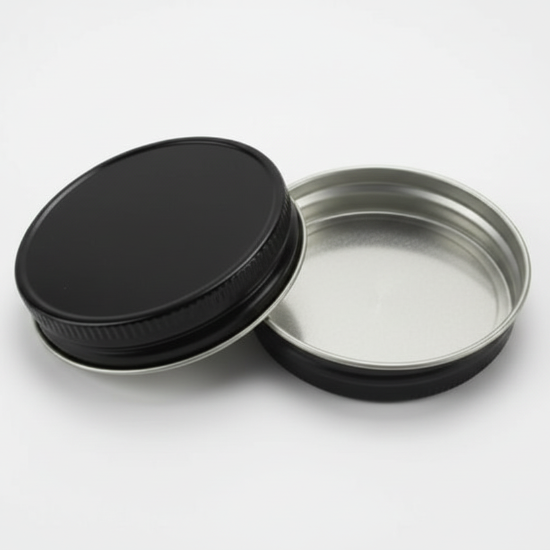 black metal lids on a white background