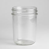 Clear glass jar on a white background