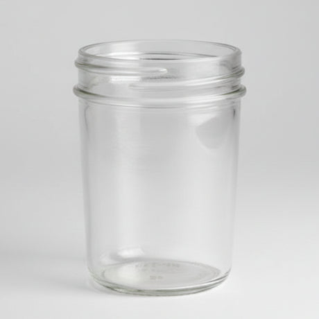 Clear glass jar on a white background