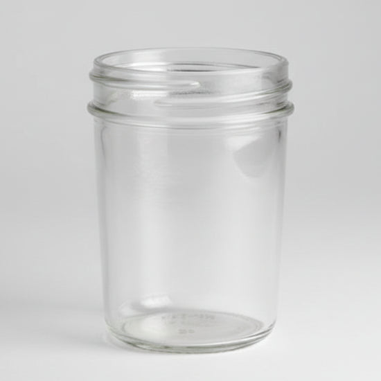Clear glass jar on a white background