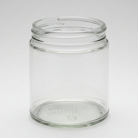 Clear glass jar on a white background