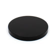 Black circular object on a white background