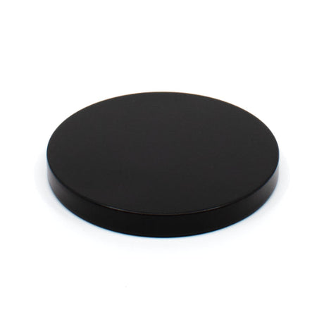 Black circular object on a white background