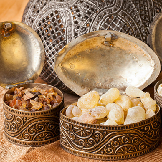 Decorative bowls with frankincense resin on a textured surface