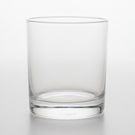 Clear glass tumbler on a white background