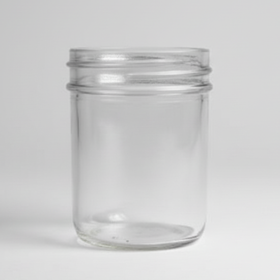 Clear glass jar on a white background