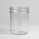 Clear glass jar on a white background