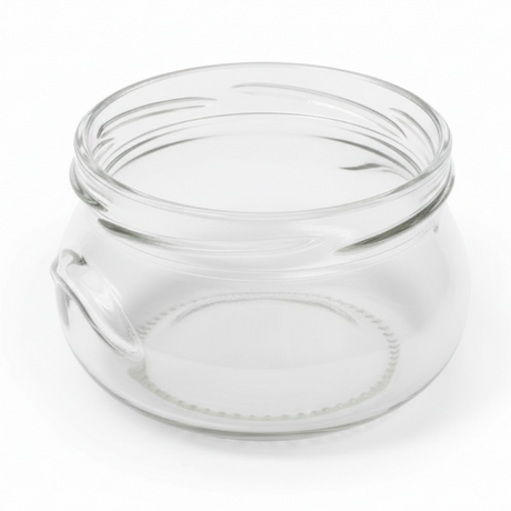 Clear glass jar with a lid on a white background