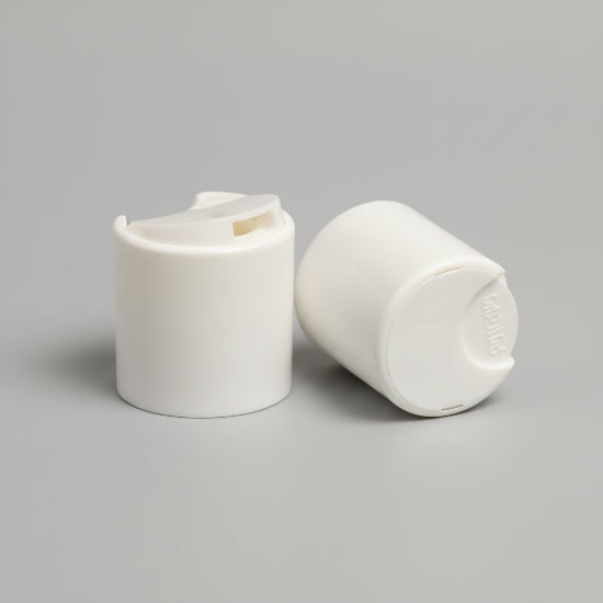 white disc lotion bottle lid