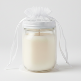 White organza drawstring bag on a green background