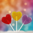 three heart shaped lolipops